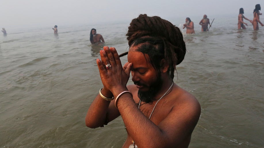 Millions Of Hindus Plunge Into Ganges River In Indian Festival Ritual 