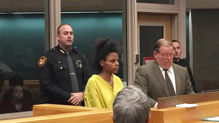 35ea9ea1-Infant Decapitated Mother Charged