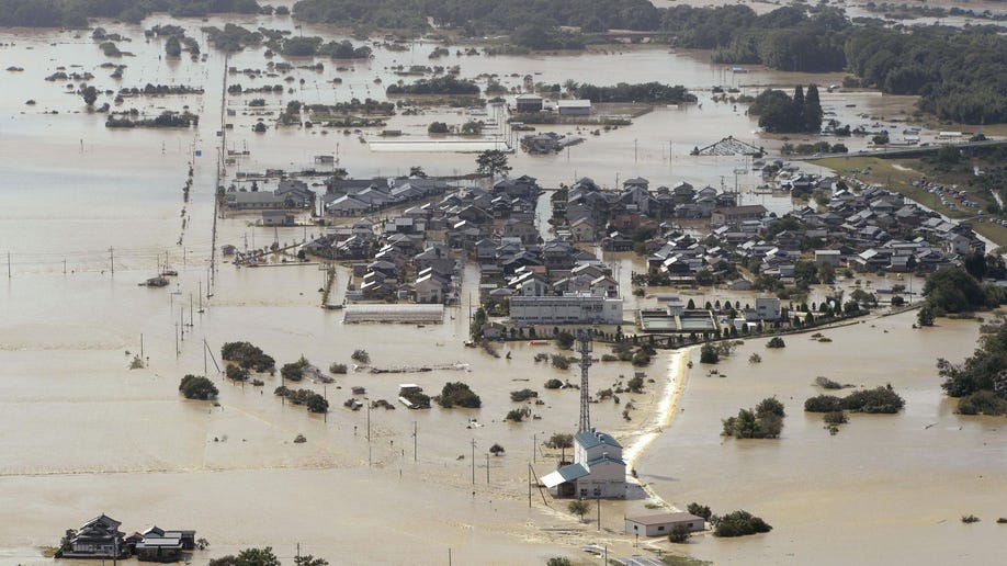 2 dead, thousands evacuated after typhoon causes major flooding in Japan