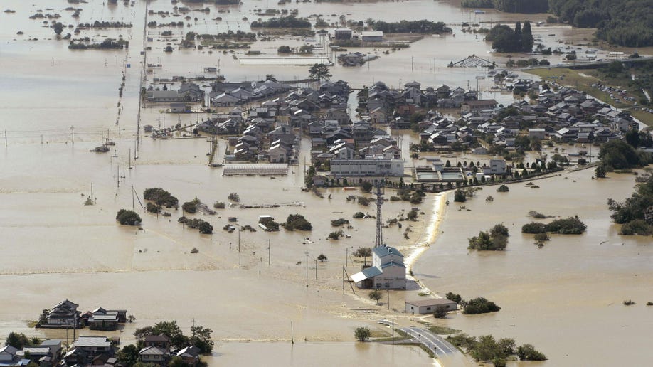 2 dead, thousands evacuated after typhoon causes major flooding in Japan