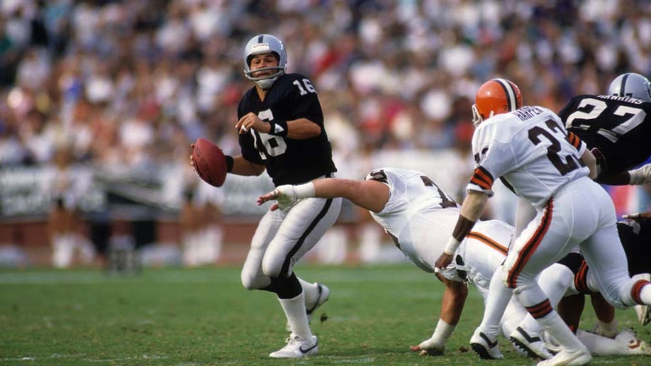 Jim Plunkett and Coach Tom Flores. The First Latin Coach in the NFL and the  First Latin QB in the NFL. They wo…