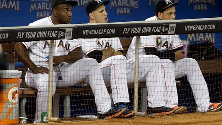 ea50eae5-Braves Marlins Baseball