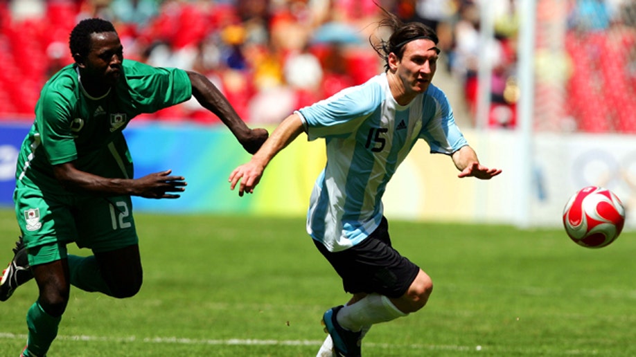 Argentina's Lionel Messi in action during the Men's Gold Medal football  match between Nigeria and Argentina of Beijing 2008 Olympic Games on Day 15  at the National Stadium in Beijing, China on