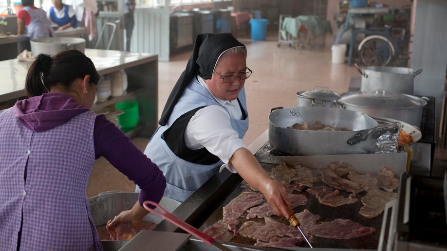 83ba47b1-Mexico Cooking Nun