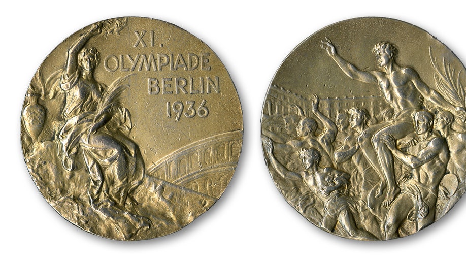 9de0f0fb-Owens Medal Auction