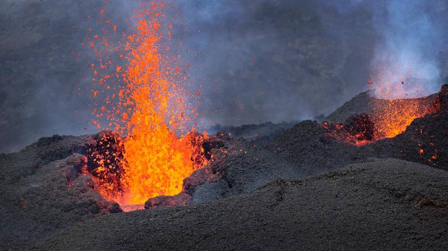 Highly active volcano erupts on Reunion amid media frenzy over missing ...