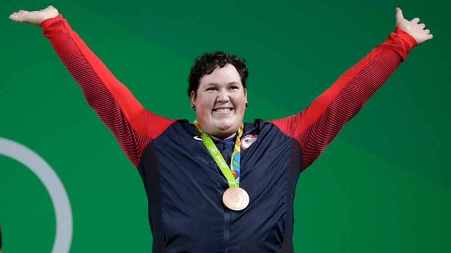 CORRECTION Rio Olympics Weightlifting Women