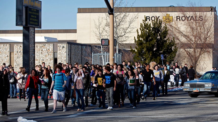 January 27: Students leave Roy High School at the end of the school day in Roy, Utah. Authorities have filed charges against a 16-year-old boy accused in a plot to detonate a bomb at a Utah high school. 