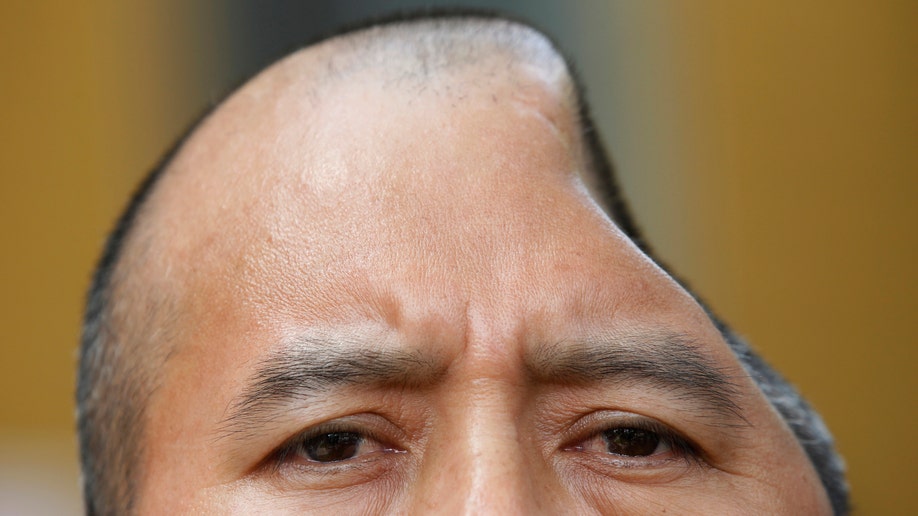 APTOPIX Huge Damage Award