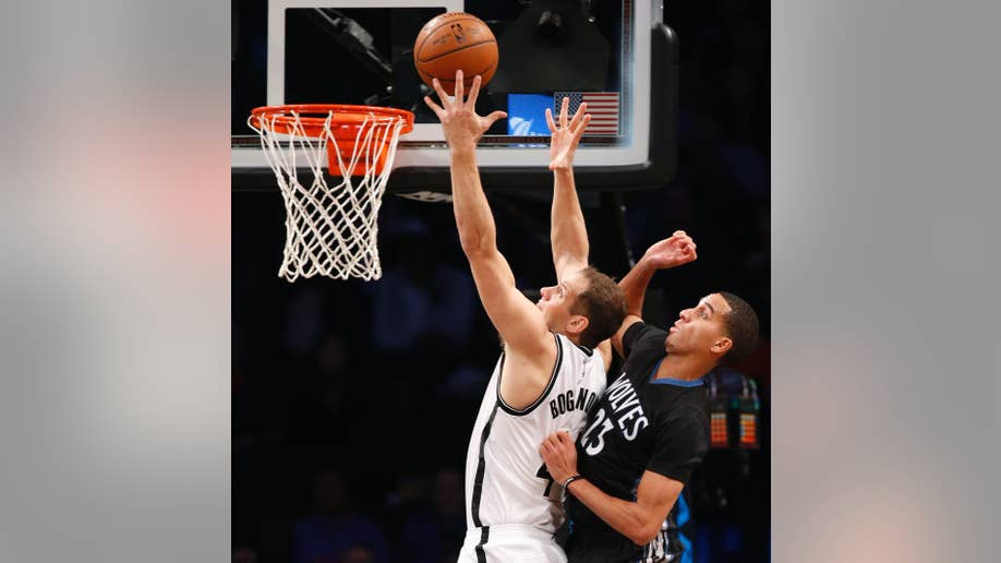 Pekovic has tiebreaking threepoint play, Timberwolves score last 9