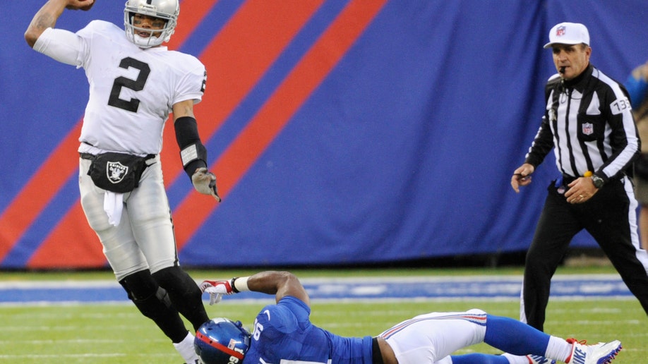 2d50e132-Raiders Giants Football