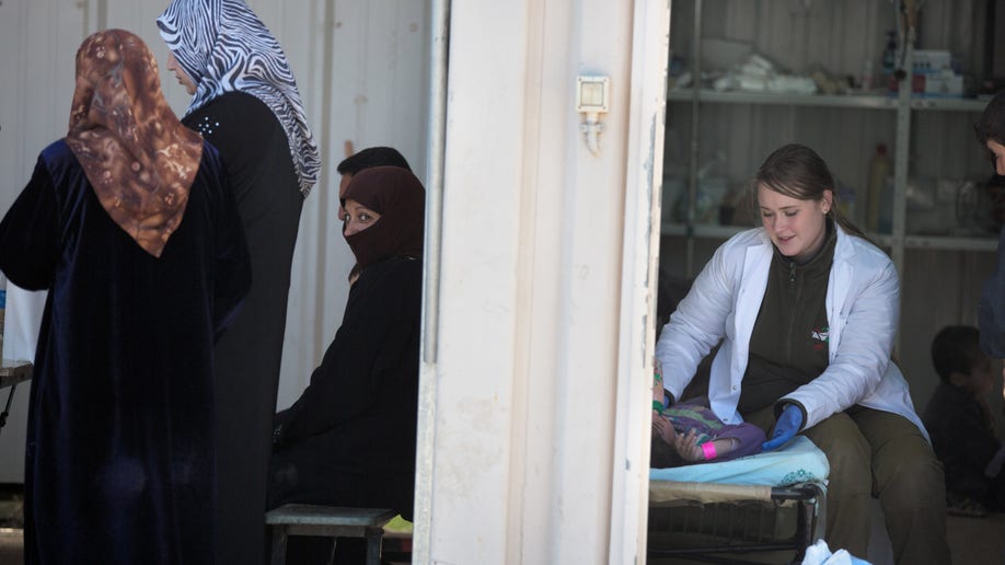 ed75dd00-Mideast Israel Syria