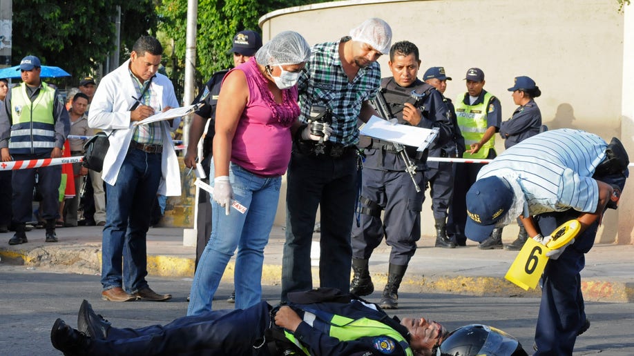 6ca93151-Honduras Teenage Cop Killer Poilce
