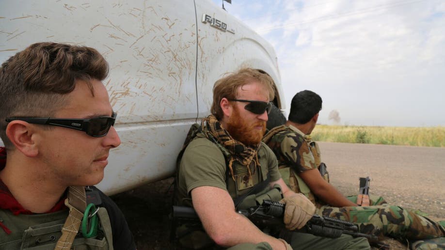 US trainers with Peshmerga