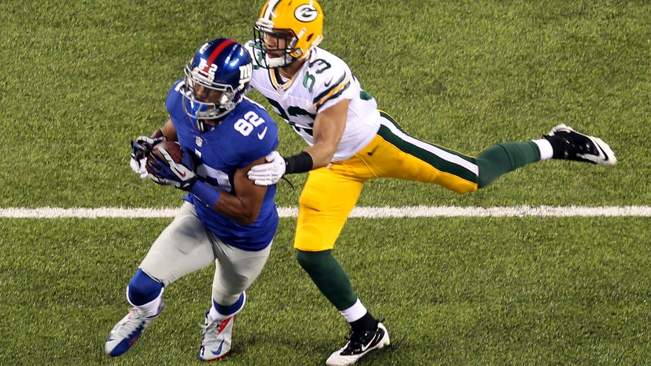 5b8c0107-Packers Giants Football