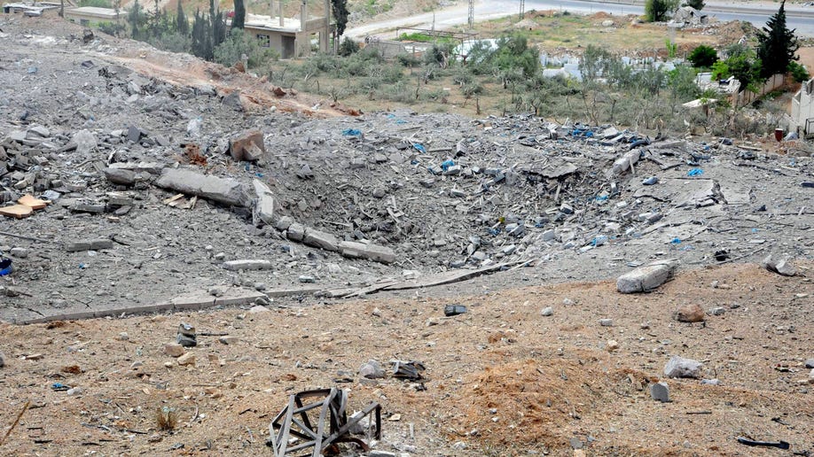 23401c39-Mideast Syria Israel