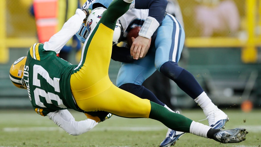 87980584-Titans Packers Football