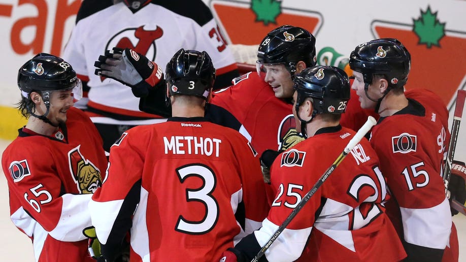 61117167-Devils Senators Hockey