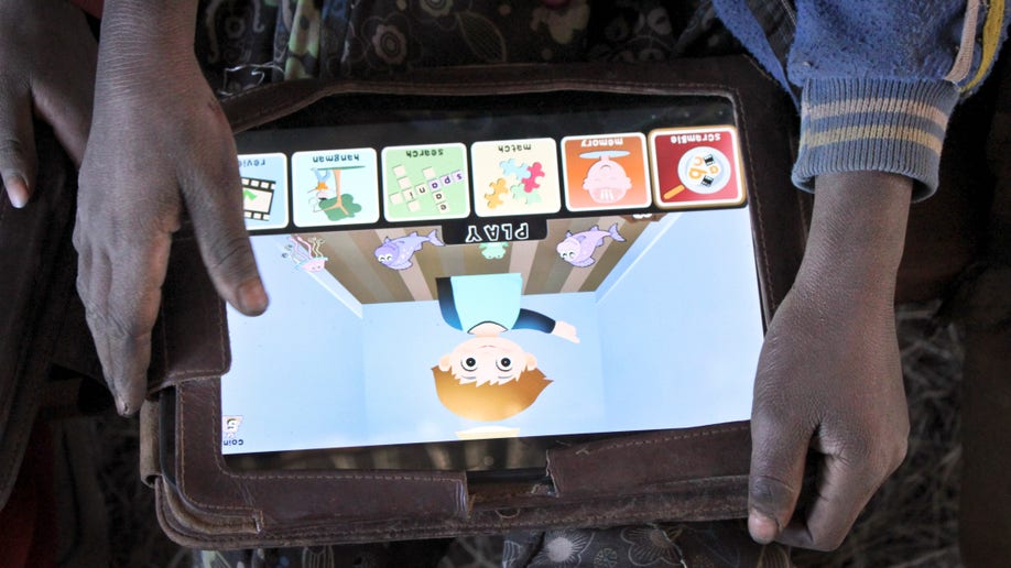 Tablet as teacher Illiterate Ethiopian kids learn to speak, write in English with computers