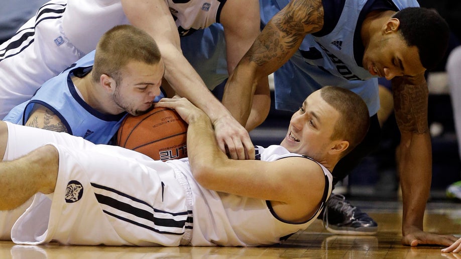 APTOPIX Rhode Island Butler Basketball