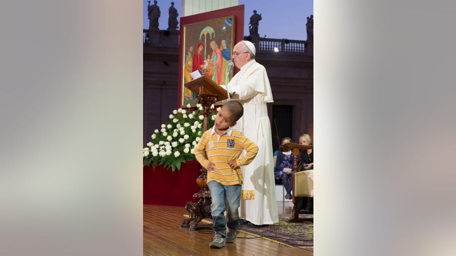 6e7440f5-Vatican Pope Child on Stage