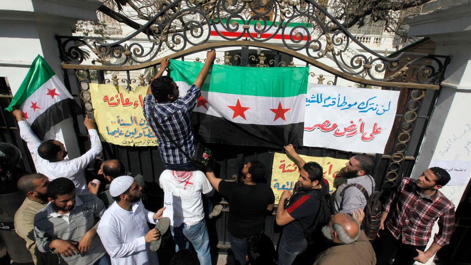 6a5a86ca-Mideast Egypt Iran