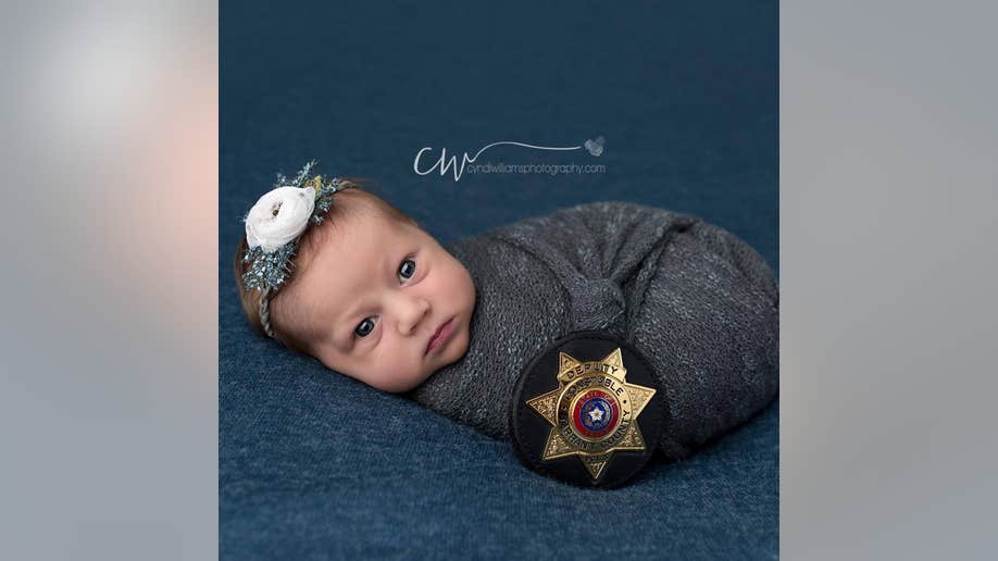 175a19ad-baby officer cyndi williams photog