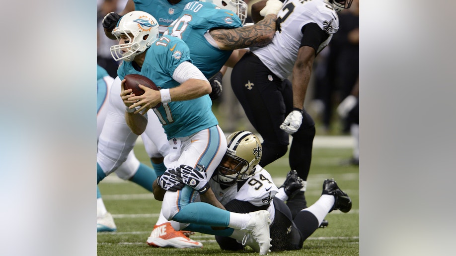 495565c4-Dolphins Saints Football