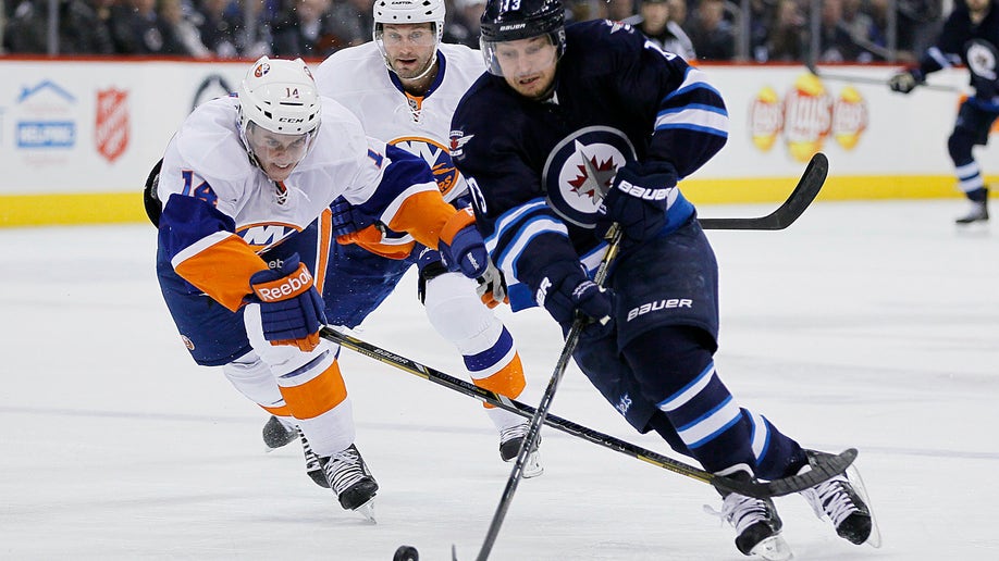 APTOPIX Islanders Jets Hockey
