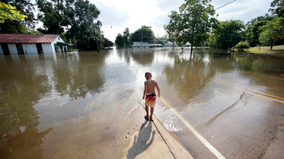 7de0dbec-APTOPIX Mississippi River Flooding