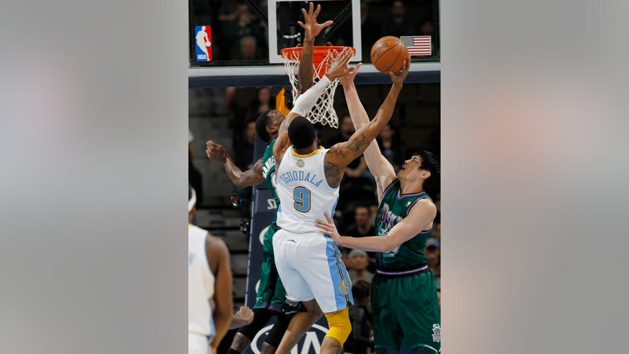 60caa995-Bucks Nuggets Basketball