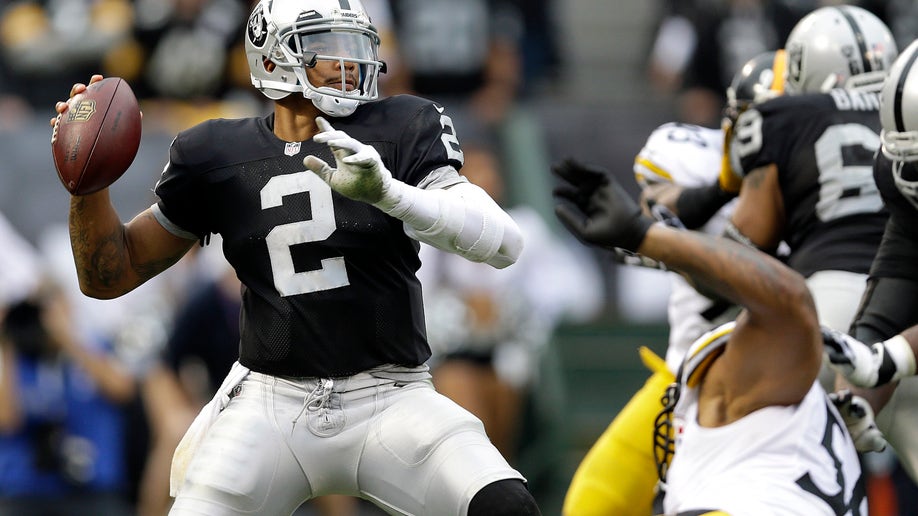 afaeb6f7-Steelers Raiders Football