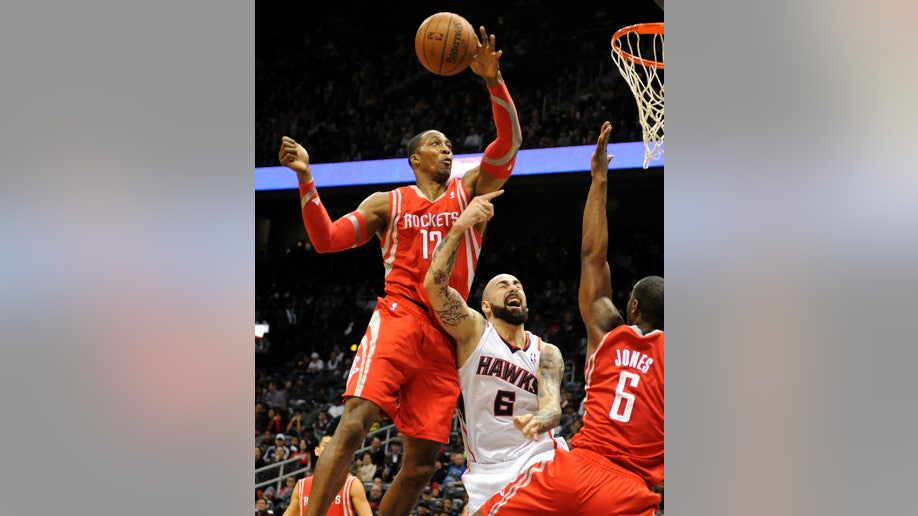 APTOPIX Rockets Hawks Basketball