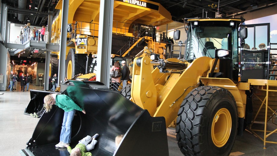 3ea69264-Travel-Trip-Playing with Bulldozers