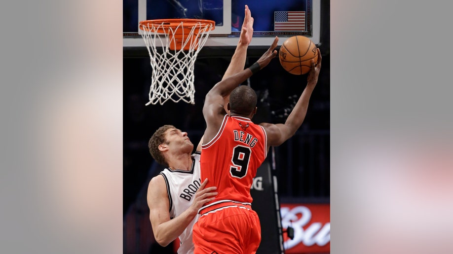 582a1453-Bulls Nets Basketball