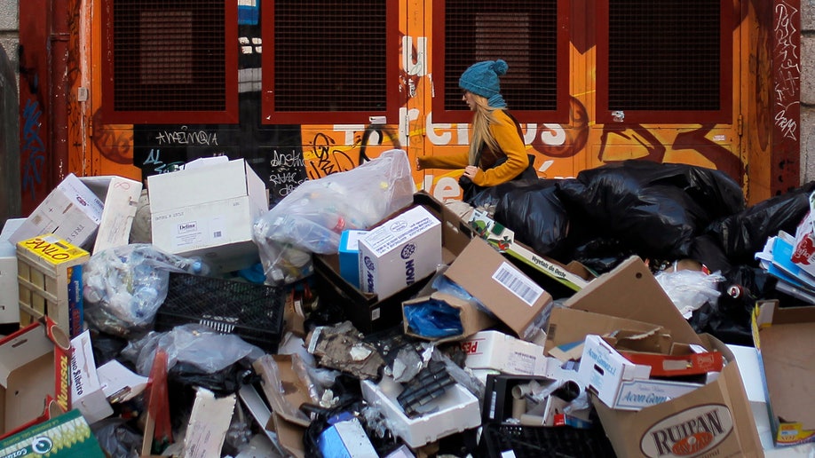 Trash collectors' strike that had filled Spain's capital with garbage