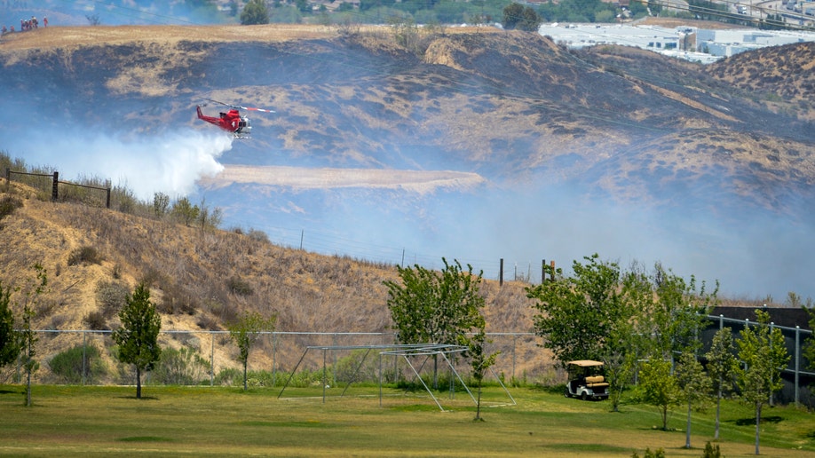 Firefighters Make Big Jumps Toward Surrounding Southern California ...