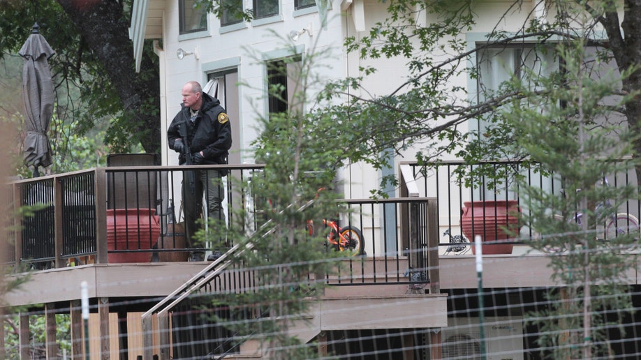 Officers hunt Calif. suspect in shooting deaths of wife, 2 young