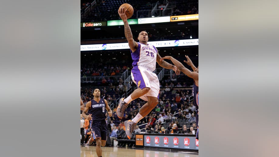 d6040c47-Bobcats Suns Basketball