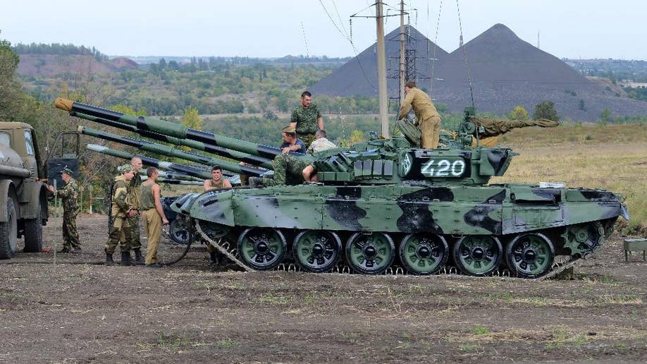 Ukraine To Pull Out Small Caliber Weapons From War Torn East After