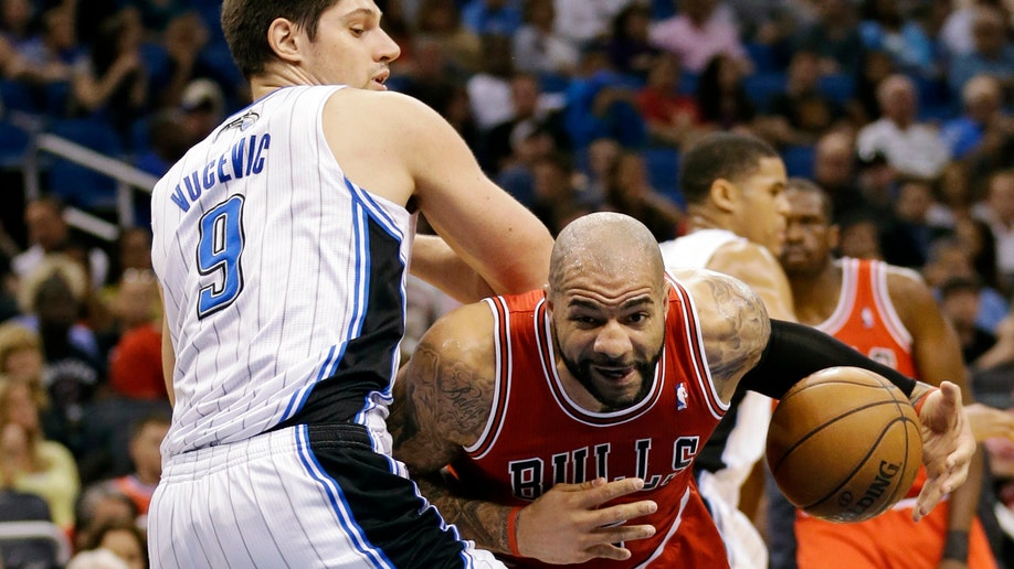 83e30df7-Bulls Magic Basketball