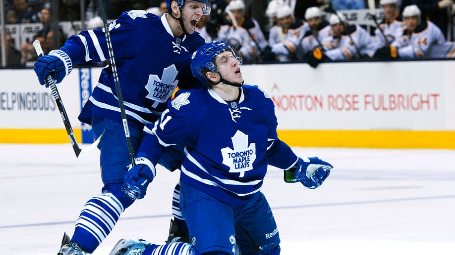 d678e407-Sabres Maple Leafs Hockey