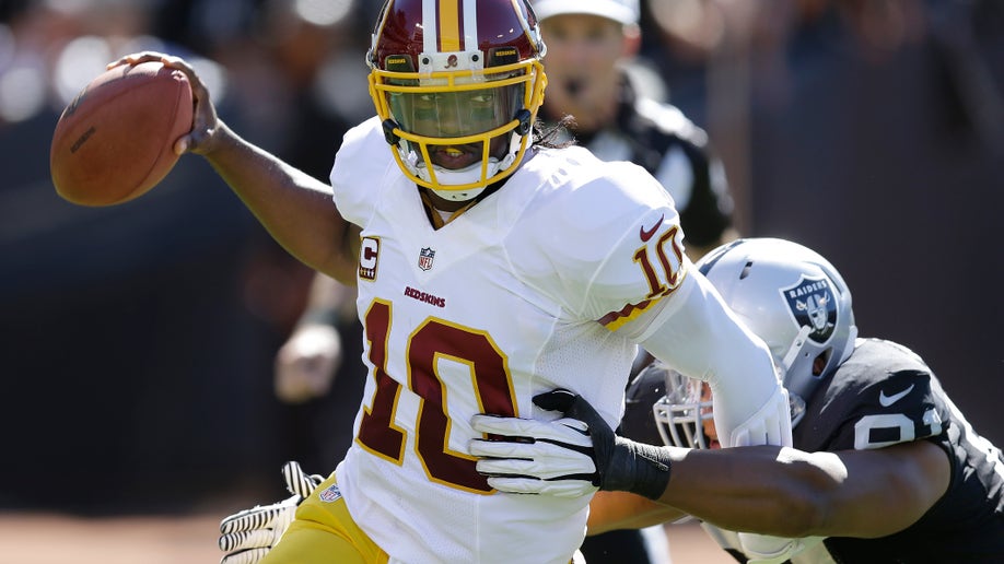 a42c3122-Redskins Raiders Football