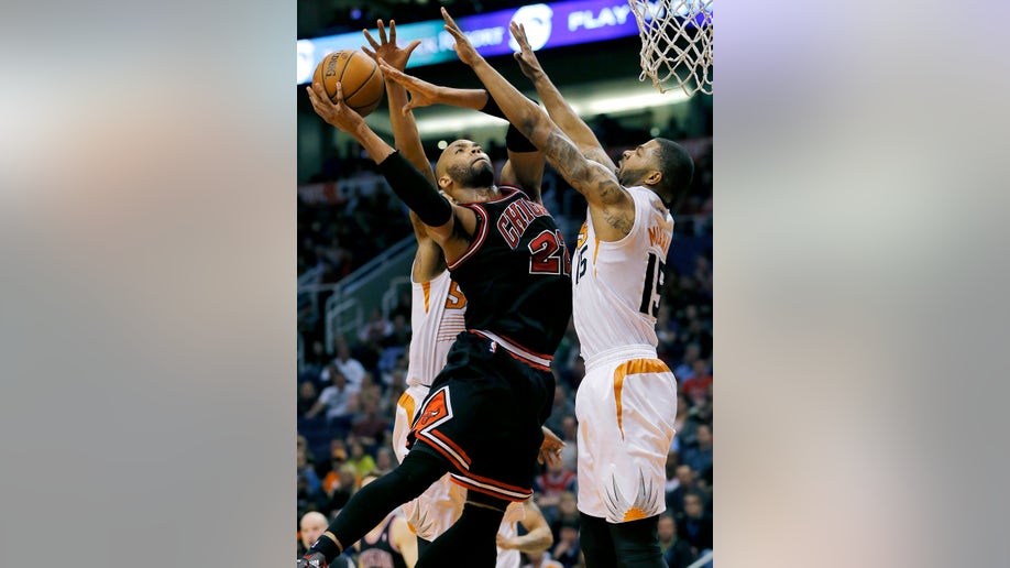 a253bbce-Bulls Suns Basketball