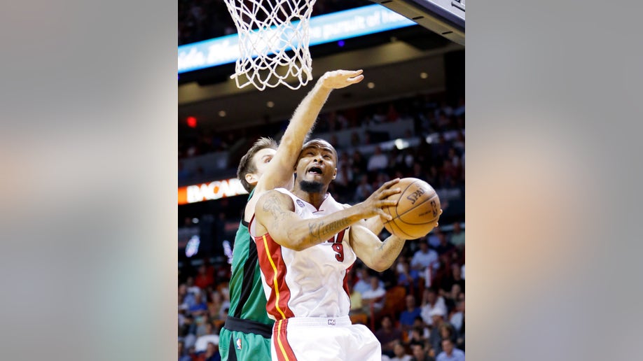 5be561e3-Celtics Heat Basketball