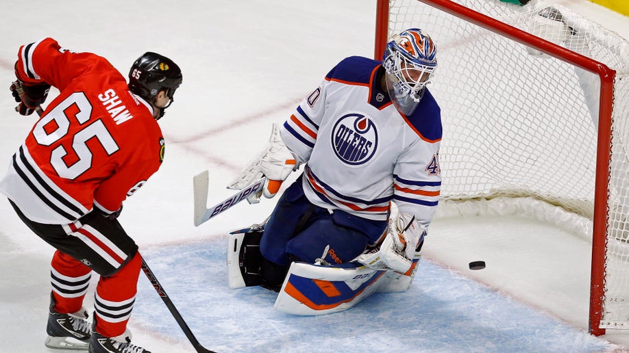 d4927f53-Oilers Blackhawks Hockey