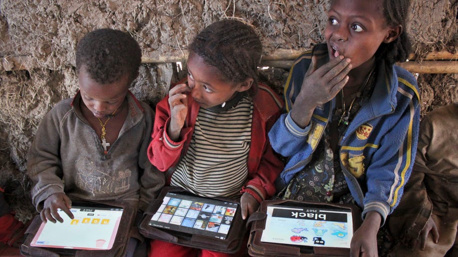Tablet as teacher Illiterate Ethiopian kids learn to speak, write in English with computers