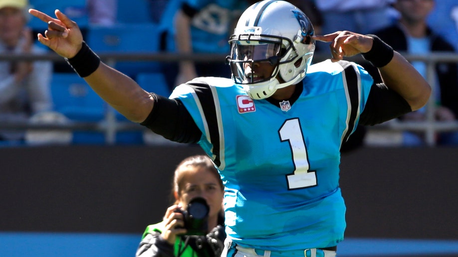 cfae9fa4-Rams Panthers Football