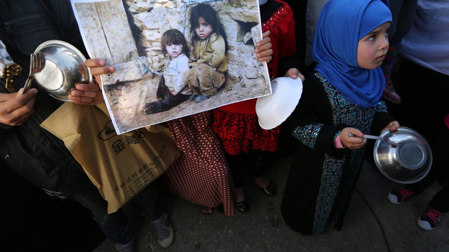 4fbfb916-Mideast Israel Palestinians