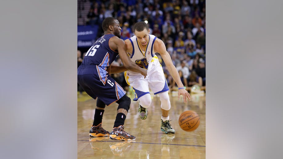 eed9fce6-Bobcats Warriors Basketball